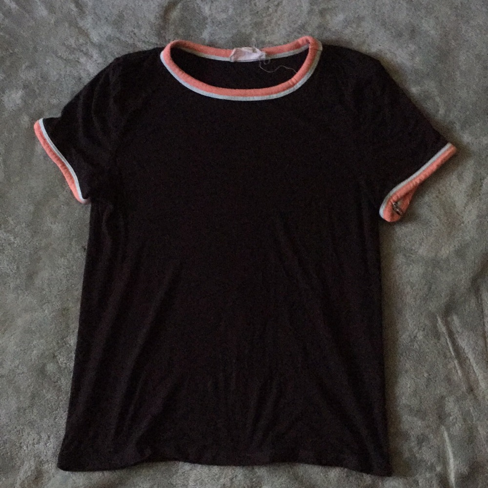 Black shirt with pink and blue accents